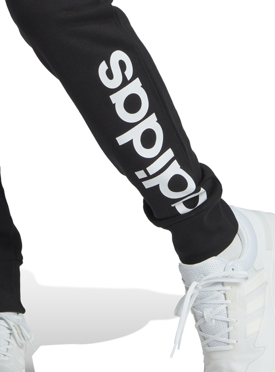 PANTALÓN DE BUZO ADIDAS ESSENTIALS PIERNA CÓNICA LOGO - 8